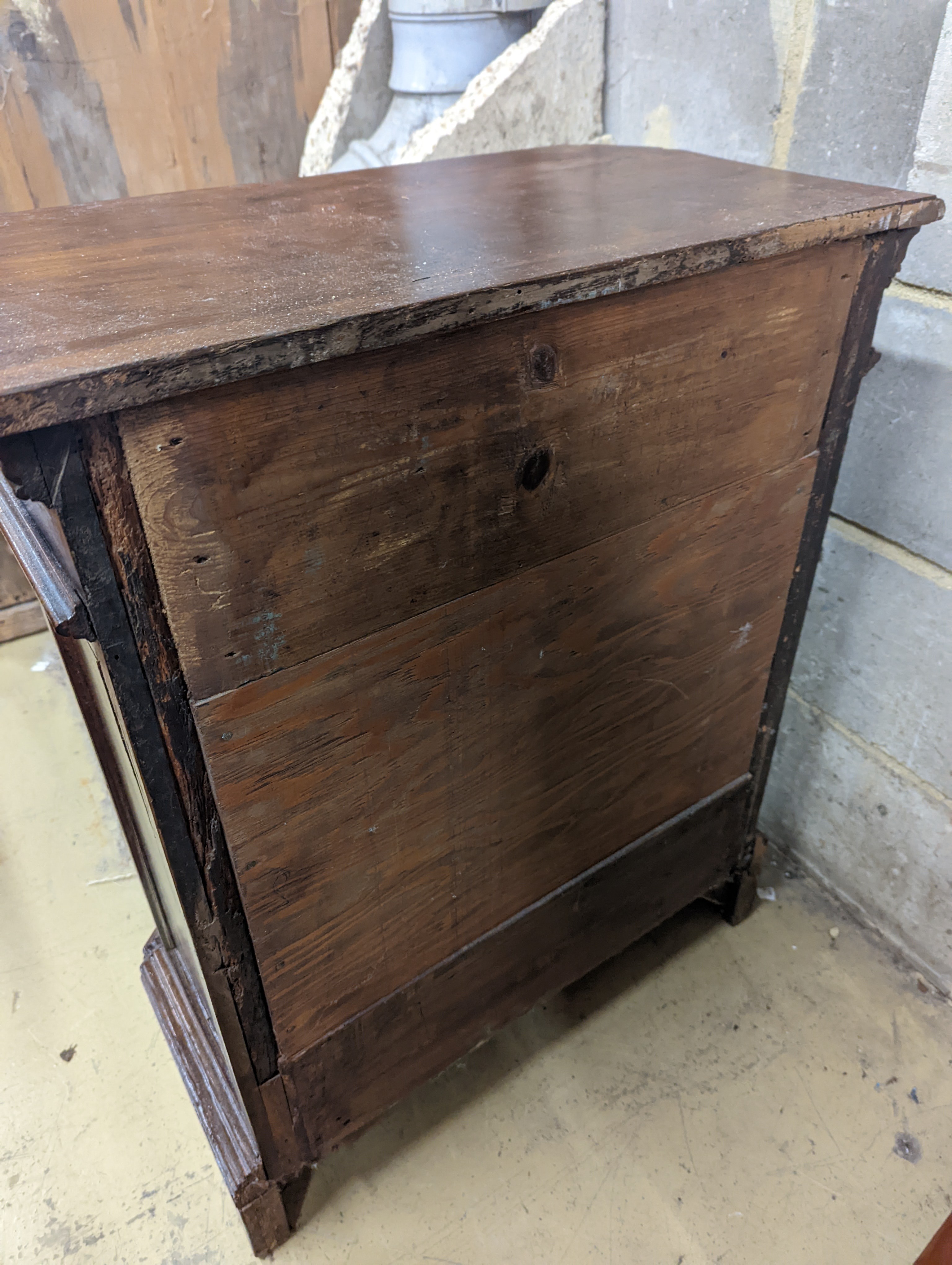 An 18th century North Italian walnut four drawer chest, width 65cm, depth 33cm, height 79cm